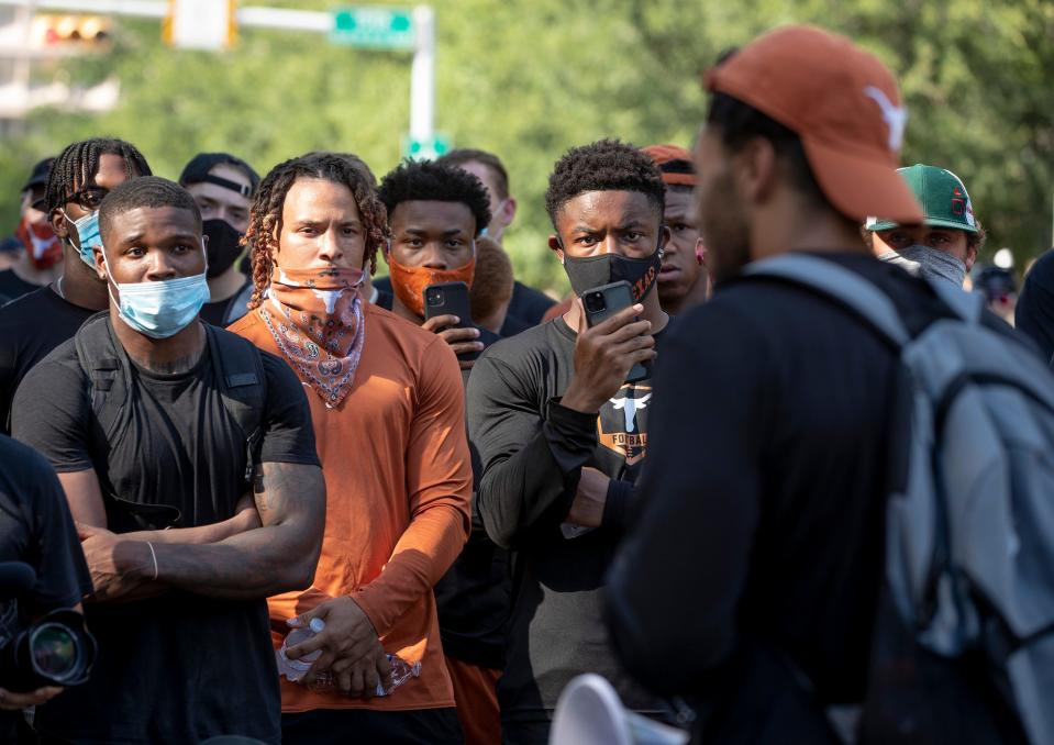 Texas football players listened to teammate Caden Strerns speak at the end of a team march to the Capitol on June 4 to protest the killing of George Floyd.