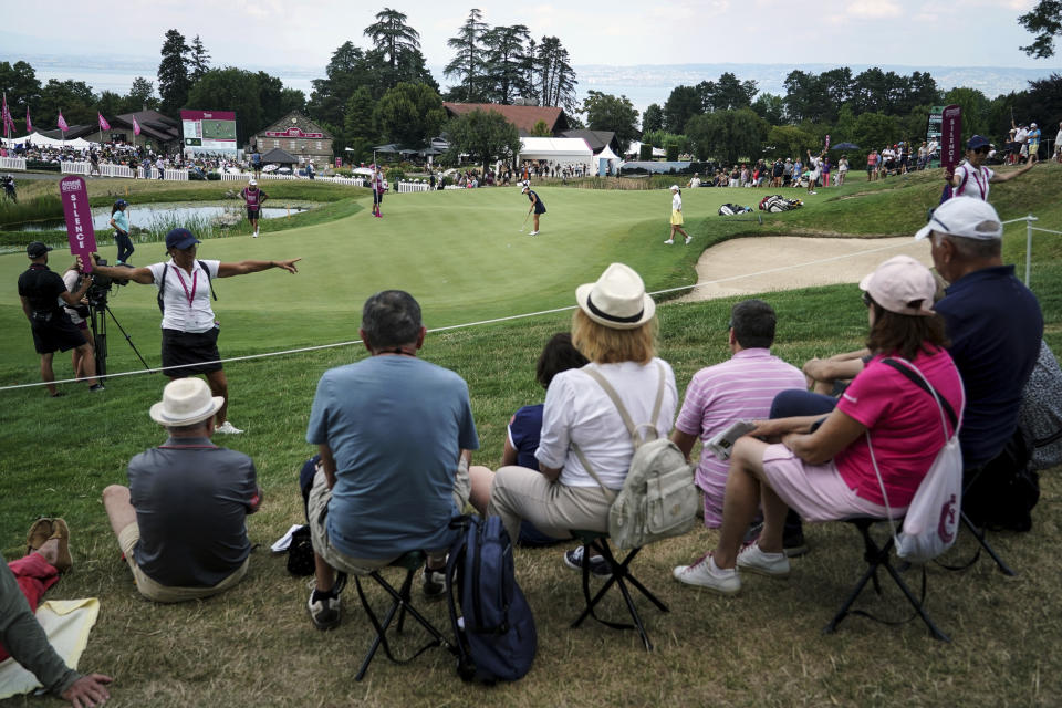 Andrea Lee, of USA, follows her ball after playing on the 16th hole during the Evian Championship women's golf tournament in Evian, eastern France, Saturday, July 23, 2022. (AP Photo/Laurent Cipriani)