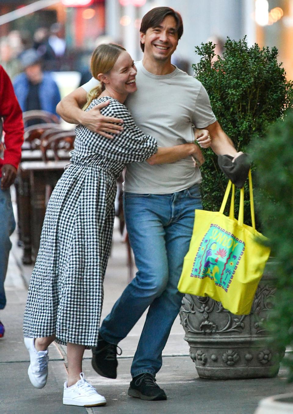 <p>Kate Bosworth and Justin Long stay connected on Sept. 8 while out in N.Y.C. </p>