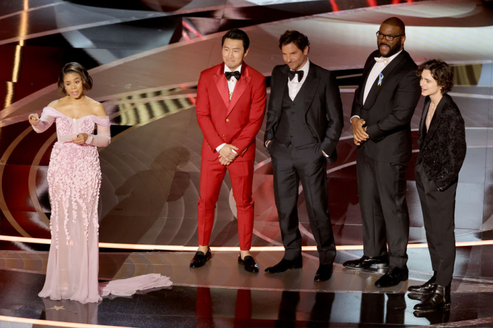 Oscars host Regina Hall alongside actors Simu Liu, Bradley Cooper, Tyler Perry and Timothée Chalamet.