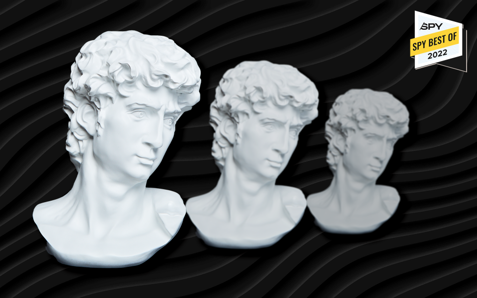 three greek busts in a row against a wavy background
