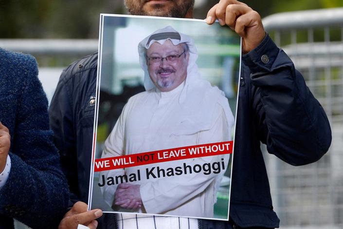 Protesters in Istanbul hold a picture of the missing journalist outside the Saudi consulate (Reuters)