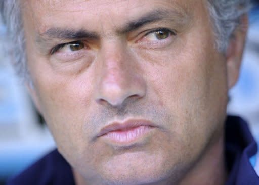 Picture taken on July 24, 2012 shows Real Madrid's coach Portuguese Jose Mourinho staring before a friendly football match between Real Oviedo and Real Madrid at the Carlos Tartiere Stadium in Oviedo. Mourinho said Wednesday he would rather lose the Spanish Super Cup to arch-rivals Barcelona if it meant his team could win La Liga