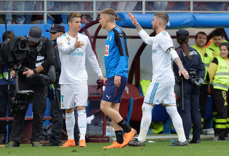 Soccer Football - La Liga Santander - Eibar vs Real Madrid - Ipurua, Eibar, Spain - March 10, 2018 Real Madrid’s Cristiano Ronaldo and Sergio Ramos celebrate after the match REUTERS/Vincent West