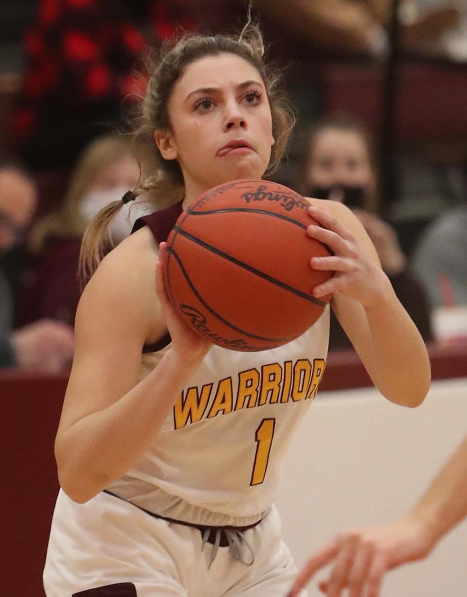 Cesily Sutton of Walsh Jesuit makes a 3-pointer during the first period of the Warriors' game against Lake Catholic at Walsh Jesuit High School in Cuyahoga Falls Wednesday night. Walsh won 48-28.