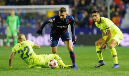 Soccer Football - Copa del Rey - Round of 16 - First Leg - Levante v FC Barcelona - Ciutat de Valencia, Valencia, Spain - January 10, 2019 Levante's Borja Mayoral in action with Barcelona's Juan Brandariz and Arturo Vidal REUTERS/Heino Kalis