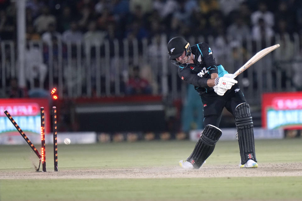 New Zealand's Tim Robinson is bowled out by Pakistan's Naseem Shah during the third T20 international cricket match between Pakistan and New Zealand, in Rawalpindi, Pakistan, Sunday, April 21, 2024. (AP Photo/Anjum Naveed)