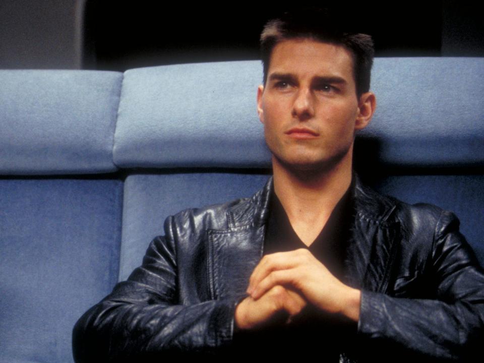 tom cruise sitting in a chair in "Mission: Impossible."