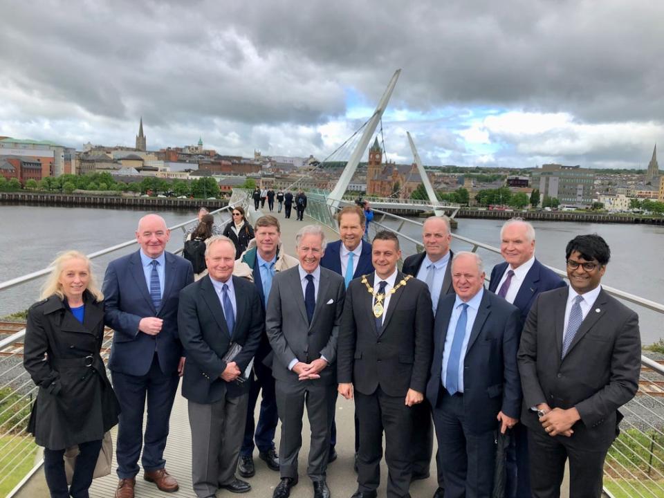 Congressman Richard Neal (centre) with mayor of Derry city and Strabane Graham Warke (third right) on the Peace Bridge (David Young/PA) (PA Wire)