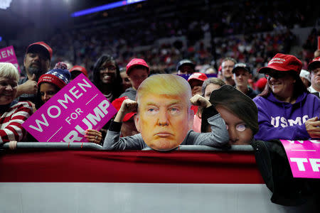 Supporters wait for the arrival of U.S. President Donald Trump for a campaign rally at the Allen County War Memorial Coliseum in Fort Wayne, Indiana, U.S., November 5, 2018. REUTERS/Carlos Barria