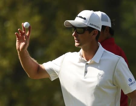 Justin Rose of Britain celebrates a birdie on the third hole during first round play of the Masters golf tournament at the Augusta National Golf Course in Augusta, Georgia April 9, 2015. REUTERS/Phil Noble