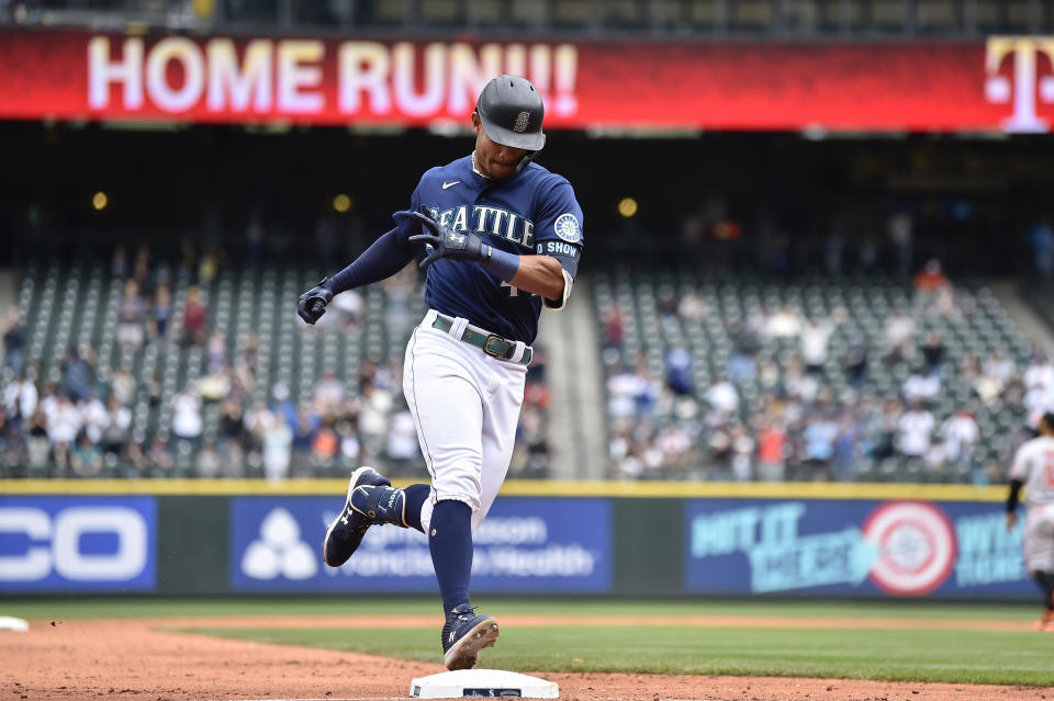 Seattle Mariners' Julio Rodriguez rounds the bases after hitting a two-run home run against the Baltimore Orioles during the fourth inning of a baseball game, Wednesday, June 29, 2022, in Seattle. (AP Photo/Caean Couto)