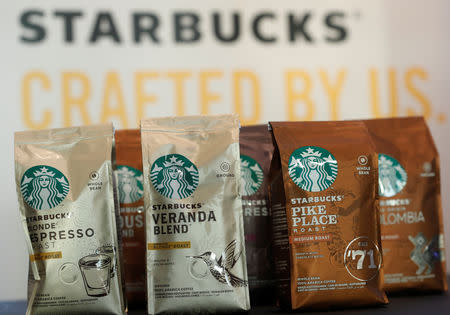 Starbucks labeled coffee bags are displayed after a news conference to announce that Nestle will sell Starbucks-branded coffee at grocery stores in Europe, Asia and Latin America at the company's headquarters in Vevey, Switzerland February 13, 2019. REUTERS/Arnd Wiegmann