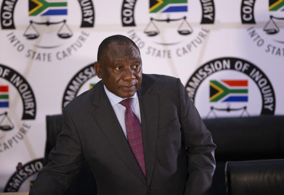 South African President Cyril Ramaphosa appears on behalf of the ruling African National Congress party at the Zondo Commission of Inquiry into state corruption in Johannesburg, South Africa, Thursday, April 29, 2021. Ramaphosa says rampant corruption has seriously damaged South Africa’s economy and people’s trust in the government. (AP Photo/Kim Ludbrook/Pool)