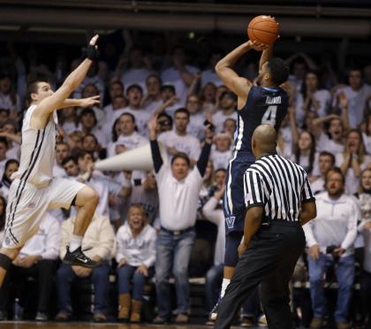 Darrun Hilliard II hits the game-winning shot over Butler's Andrew Chrabascz. (AP)