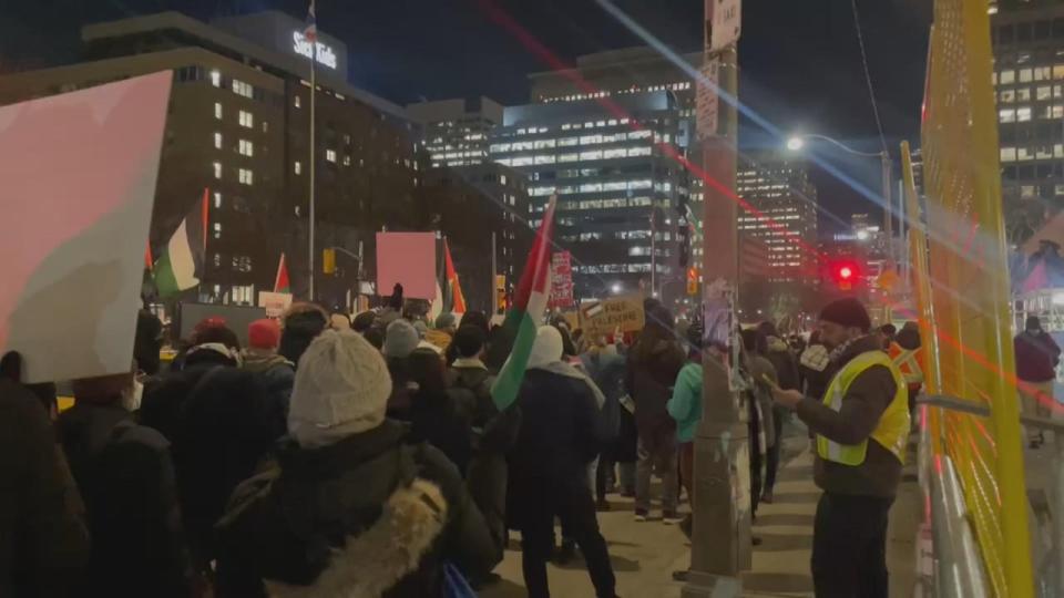 Protesters seen here with Palestinian flags on hospital row Monday. Politicians including Prime Minister Justin Trudeau and Ontario Premier Doug Ford have denounced the protest. (Linda Reddekopp/CBC - image credit)