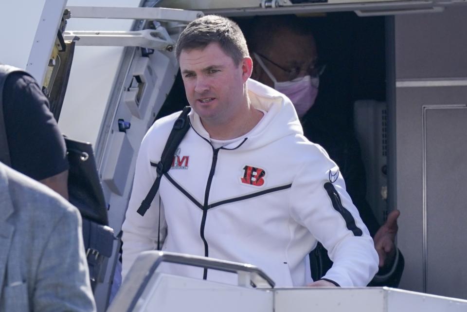 Cincinnati Bengals head coach Zac Taylor arrives at Los Angeles International Airport Tuesday, Feb. 8, 2022, in Los Angeles. The Bengals face the Los Angeles Rams in Super Bowl LVI on Sunday, Feb. 13, 2022. (AP Photo/Mark J. Terrill)