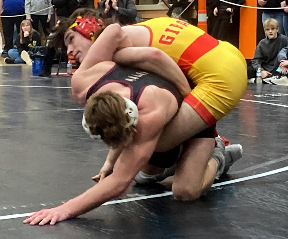 Girard 152-pounder Story Buchanan, top, enters the PIAA Class 2A tournament with a 38-1 record this season.