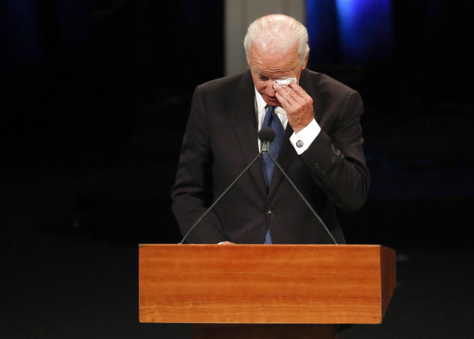 Former Vice President Joe Biden wipes a tear while giving a tribute during memorial service at North Phoenix Baptist Church for Sen. John McCain on Aug. 30, 2018, in Phoenix. (AP Photo/Matt York, Pool)