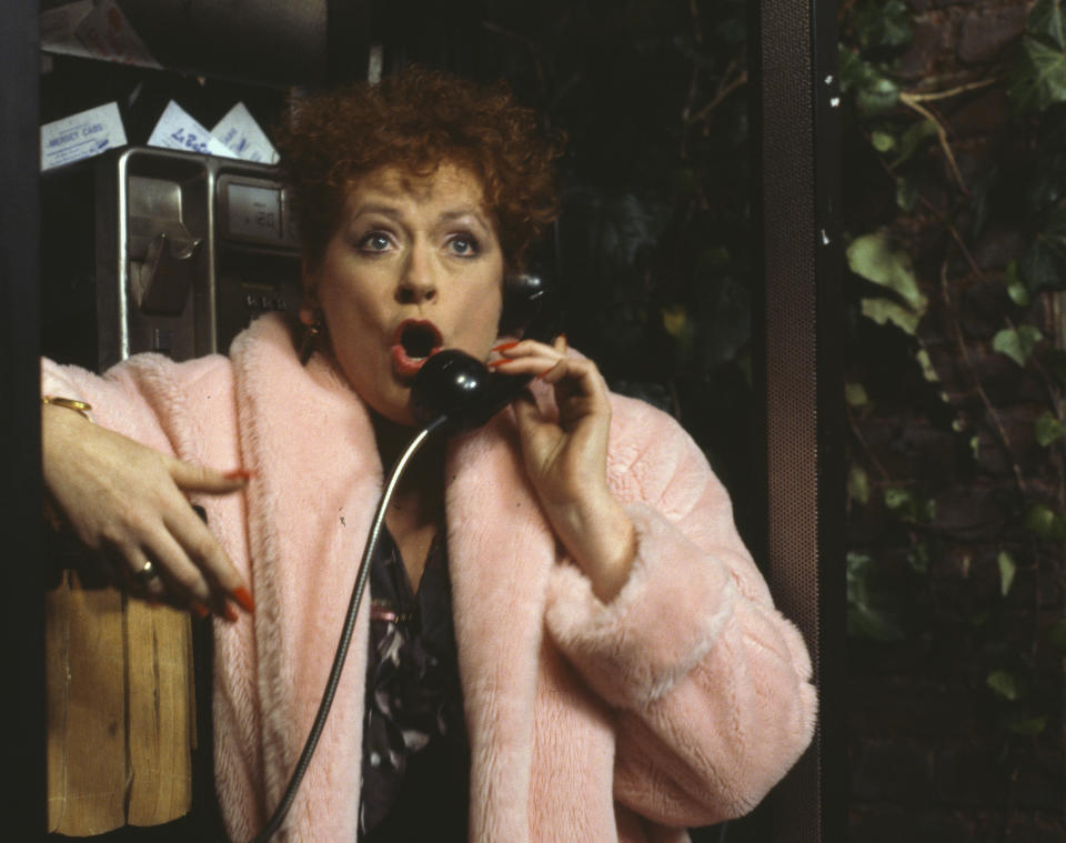 Actress Eileen Pollock using a telephone in a scene from the Christmas special of the BBC television sitcom 'Bread', November 11th 1990. (Photo by Don Smith/Radio Times/Getty Images)