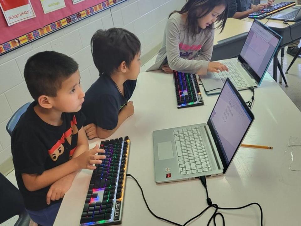 Students at St. Louis School on English River First Nation using the specialized Dene language keyboards.  (Submitted by Michèle Mackasey  - image credit)