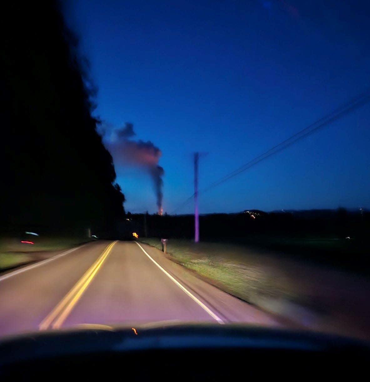 Crews from SW Polk Fire District could see from miles away the pillar of smoke from a three-alarm barn fire in Amity.