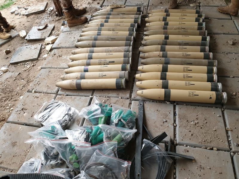 Unused Katyusha rockets found by the Iraqi Army are seen f Umm al-Izam