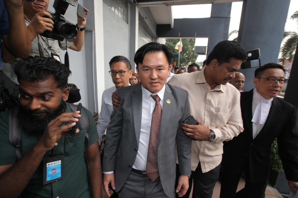 Perak state executive councillor Paul Yong walks to the Sessions Court in Ipoh where he is expected to be charged with rape on August 23, 2019. — Picture by Farhan Najib