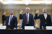 Steven Engel, former Assistant Attorney General for the Office of Legal Counsel, from left, Jeffrey Rosen, former acting Attorney General, and Richard Donoghue, former acting Deputy Attorney General, are sworn in to testify as the House select committee investigating the Jan. 6 attack on the U.S. Capitol continues to reveal its findings of a year-long investigation, at the Capitol in Washington, Thursday, June 23, 2022. (AP Photo/Jacquelyn Martin)