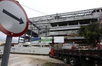 The front of the Arena da Baixada soccer stadium is pictured as it is being built to host matches of the 2014 World Cup in Curitiba, February 18, 2014. FIFA will stick with plans to hold World Cup matches in Curitiba, officials said on Tuesday, backing down from a threat of dropping the host city due to delayed work on a stadium. REUTERS/Rodolfo Buhrer (BRAZIL - Tags: SPORT SOCCER WORLD CUP)