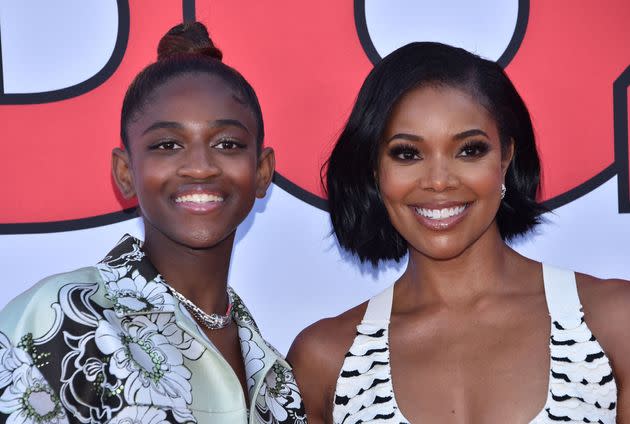 Zaya Wade, left, with her mother, Gabrielle Union. (Photo: CHRIS DELMAS via Getty Images)