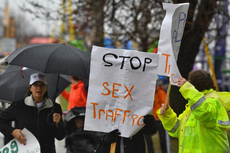 Hundreds of marchers gather for the "Walk Together- Uniting Against Sex Trafficking" event Saturday, April 30, 2022, in St. Cloud, Minnesota.