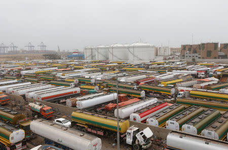 FILE PHOTO: Oil tankers are seen parked during a countrywide strike by the All Pakistan Oil Tankers Association (APOTA) against the imposition of safety regulations by the Oil and Gas Regulatory Authority (OGRA) in Karachi, Pakistan July 24, 2017. REUTERS/Akhtar Soomro/File Photo