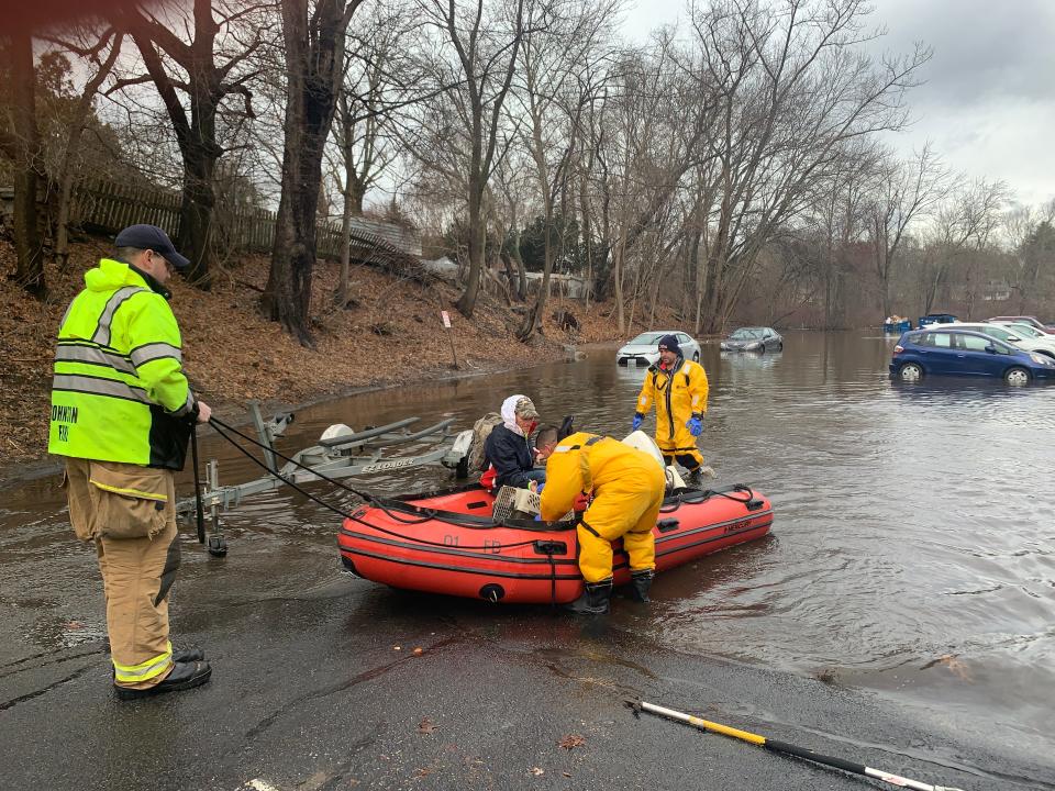 Rescued with his cat, the resident had to flee his Johnston, Rhode Island apartment after flooding in the surrounding area