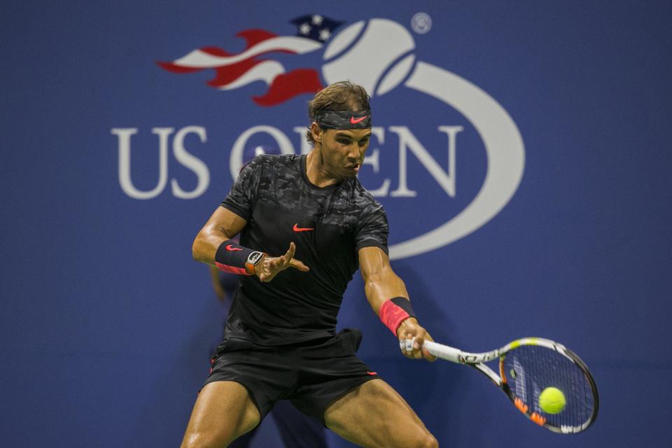 Rafael Nadal of Spain hits a return to Borna Coric of Croatia during their match at the U.S. Open Championships tennis tournament in New York, August 31, 2015. REUTERS/Lucas Jackson