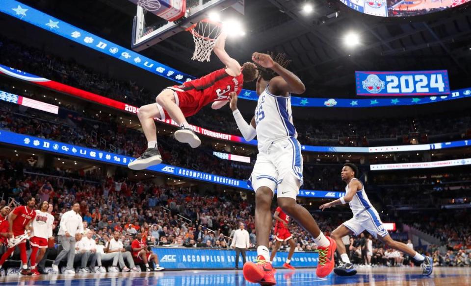 N.C. State’s Ben Middlebrooks (34) is called for a technical after missing his dunk and grabbing the ball while still hanging on the rim late in the second half of N.C. State’s 74-69 victory over Duke in the quarterfinal round of the 2024 ACC Men’s Basketball Tournament at Capital One Arena in Washington, D.C., Thursday, March 14, 2024. Ethan Hyman/ehyman@newsobserver.com