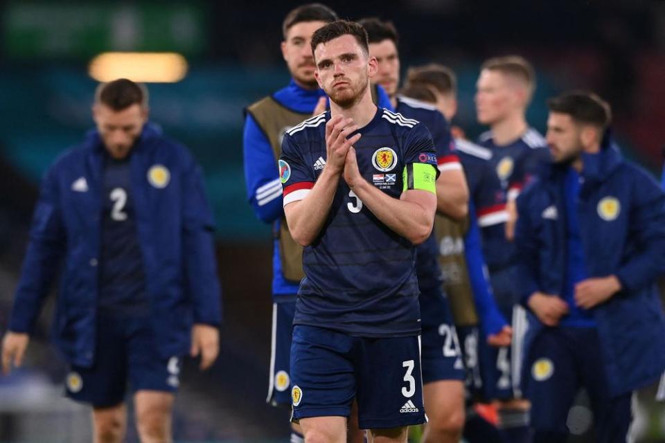 Andrew Robertson applauds the crowd after their defeat to Croatia.