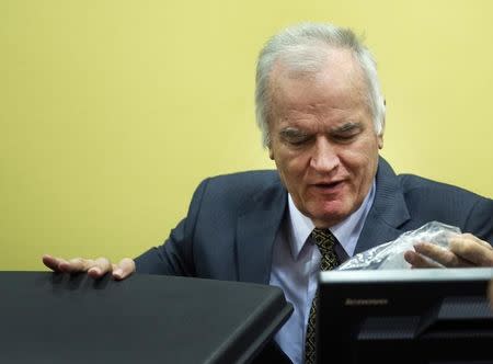 File photo: Former Bosnian Serb army commander Ratko Mladic attends his trial at the International Criminal Tribunal for the former Yugoslavia (ICTY) at The Hague May 16, 2012. REUTERS/Toussaint Kluiters