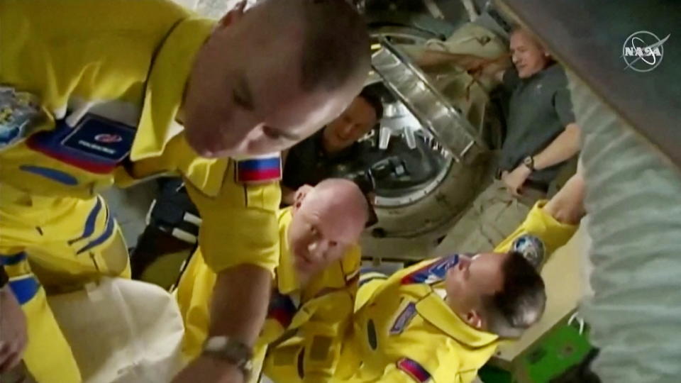 Russian cosmonaut in yellow