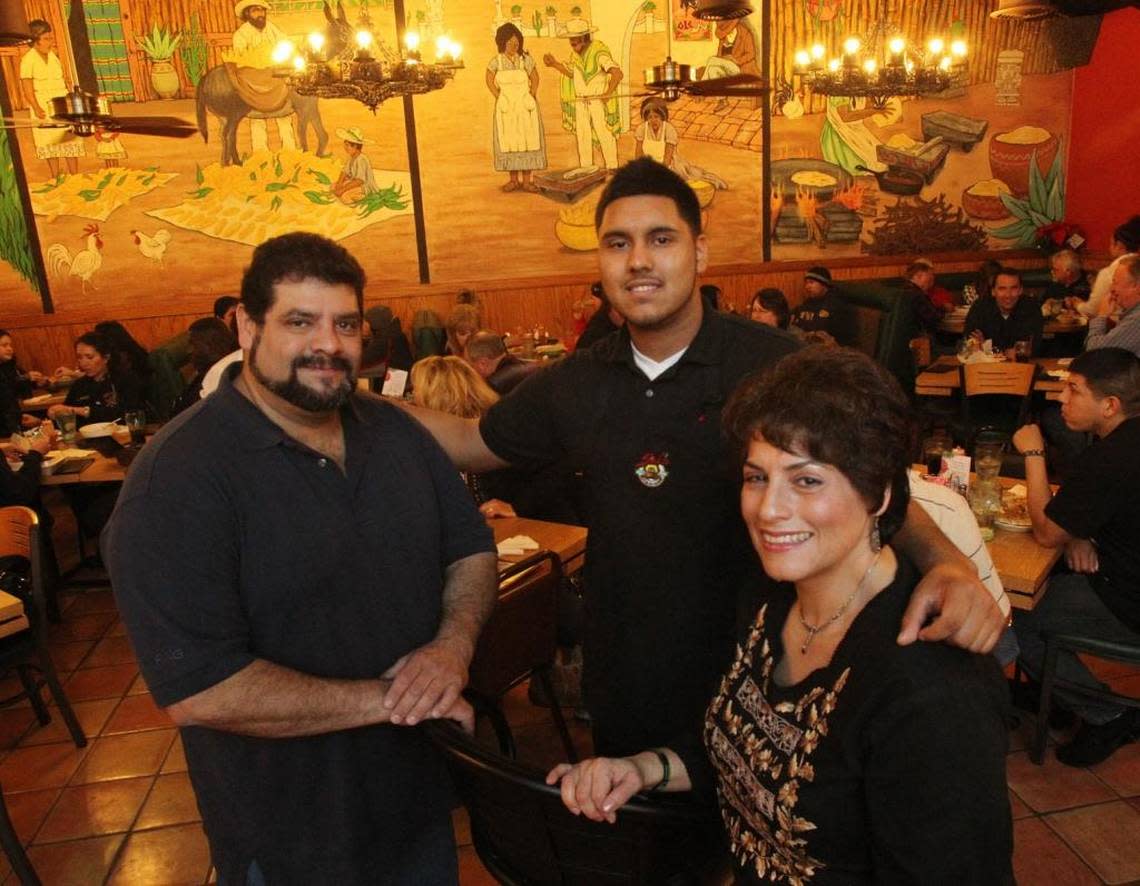 Lorraine Salazar, at right, and Karl Salazar, far left, are owners of Sal’s Mexican Restaurant in this file photo taken in 2010. At center is the restaurant’s namesake Sal Salazar, Karl’s 18-year-old son.