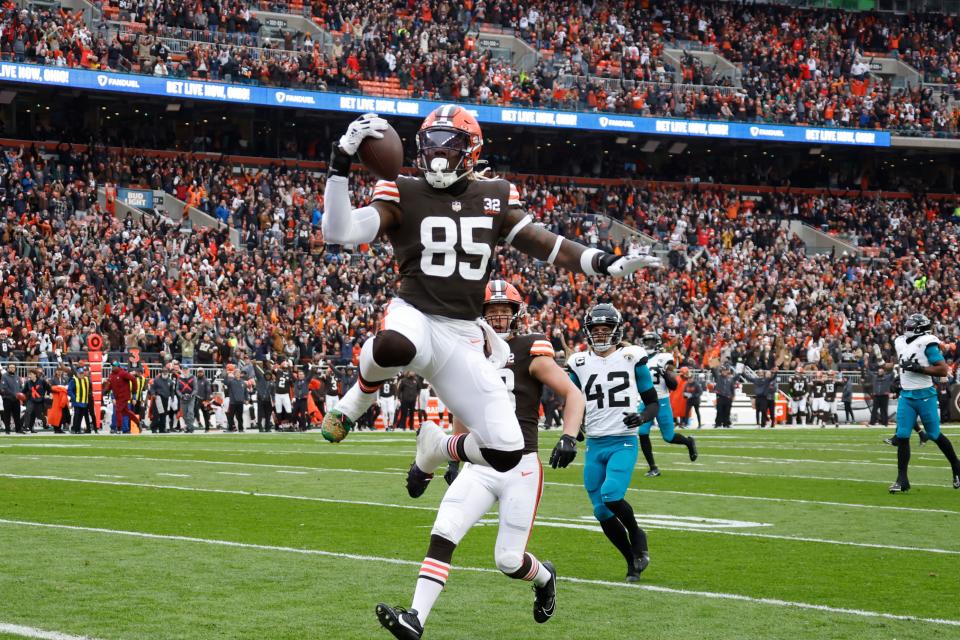 Cleveland Browns tight end David Njoku (85) jumps into the end zone for a 34-yard touchdown against the Jacksonville Jaguars on Dec. 10, 2023, in Cleveland.