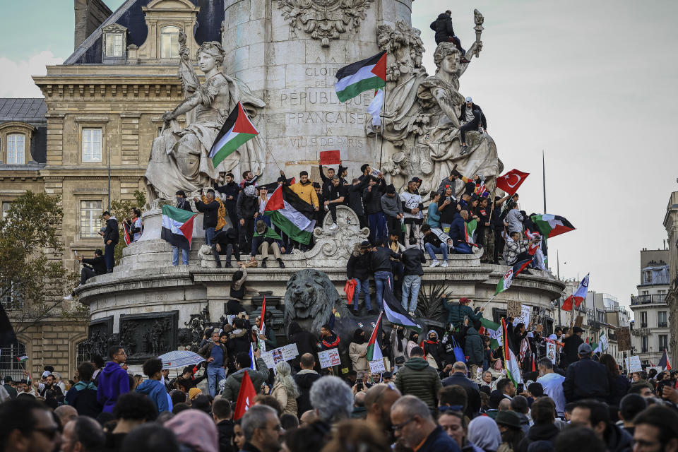 Protesters take part during a demonstration organized by the "National Collective for a just and lasting peace between Palestinians and Israelis" in Paris, Sunday, Oct. 22, 2023. (AP Photo/Aurelien Morissard)