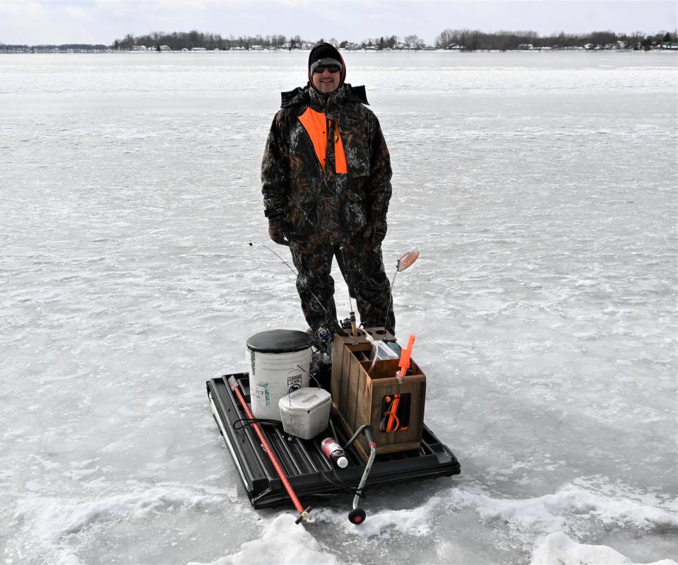 Craig Scheidler spent a day off Friday ice fishing on the north end of Coldwater where ice was clear and five inches thick.