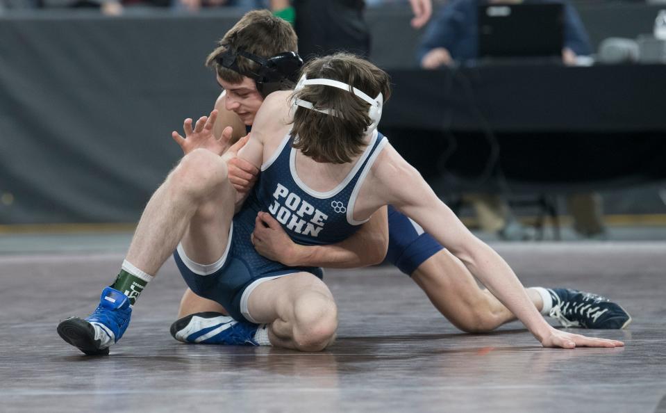 Eastern’s Jared Brunner, back, controls Pope John XXIII’s Carson Walsh during a 113 lb. bout of the semi-final round of the 2022 NJSIAA Wrestling Championships held at Boardwalk Hall in Atlantic City on Friday, March 4, 2022.   Brunner defeated Walsh, 3-1.  