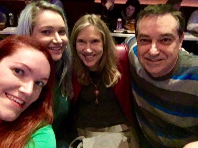 Iowa Columnist Courtney Crowder (far left) with her family: Audrey (her sister), Linda (her mother) and Tom (her father) at a Second City Show in Chicago, Illinois, in December 2017.