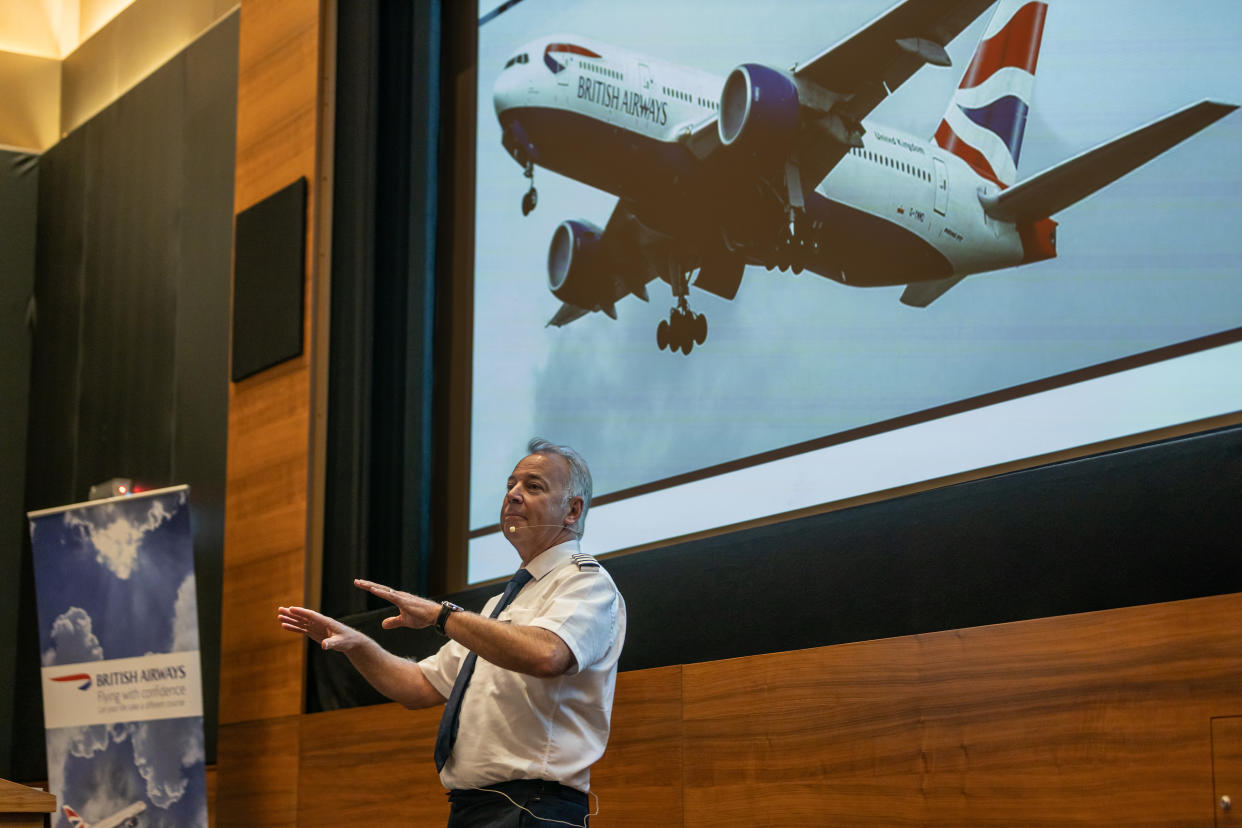 Capt. Steve Allright leads a session for nervous fliers for British Airways at a hotel at Heathrow Airport in London, Oct. 14, 2023. (Jeremie Souteyrat/The New York Times)