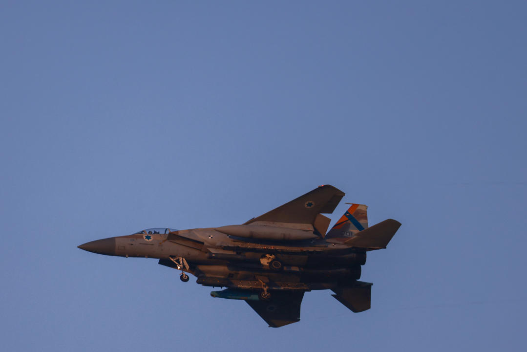 An Israeli army f-15 fighter jet flies over central Israel on April 15, 2024. (Photo by Menahem KAHANA / AFP) (Photo by MENAHEM KAHANA/AFP via Getty Images)