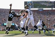 <p>Mario Addison #97 of the Carolina Panthers blocks a pass by quarterback Case Keenum #17 of the Los Angeles Rams in the endzone during the first quarter of the game at the Los Angeles Coliseum on November 6, 2016 in Los Angeles, California. (Photo by Stephen Dunn/Getty Images) </p>