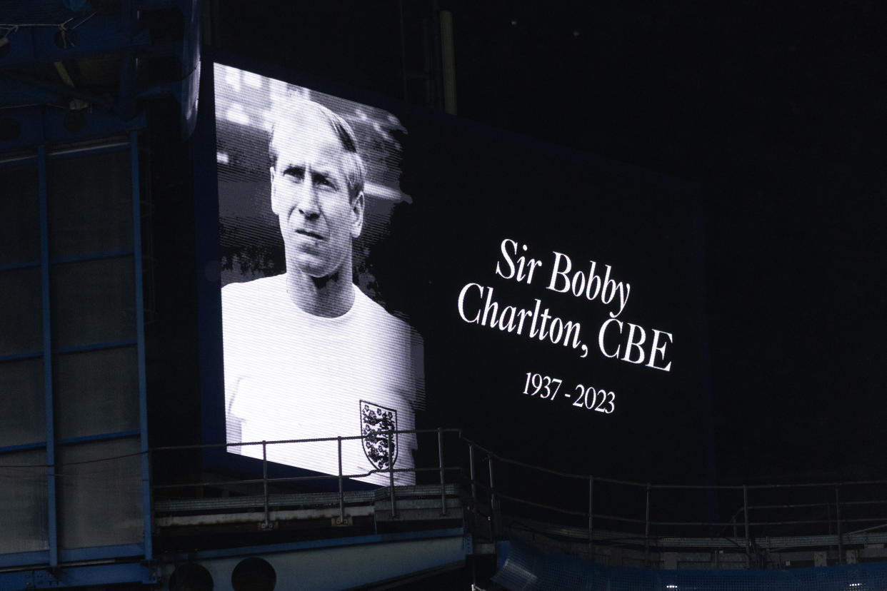 A tribute to the late England and Manchester United midfielder Bobby Charlton is show on the big screen at Stamford Bridge during the match between Chelsea and Arsenal.