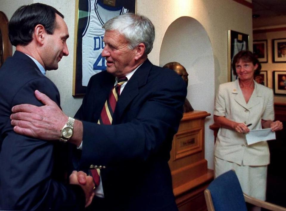 News & Observer file art: Duke basketball coach Mike Krzyzewski, left, congratulates athletic director Tom Butters after Butters announced his retirement in 1997. Butters passed away in 2016. Chuck Liddy/cliddy@newsobserver.com